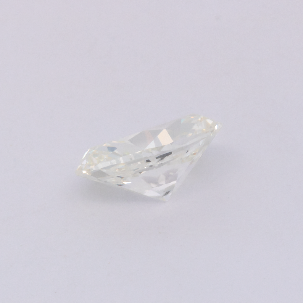 Diamond - tinted white, oval, 7.02x4.78 mm, 0.77 ct, No. DT1010