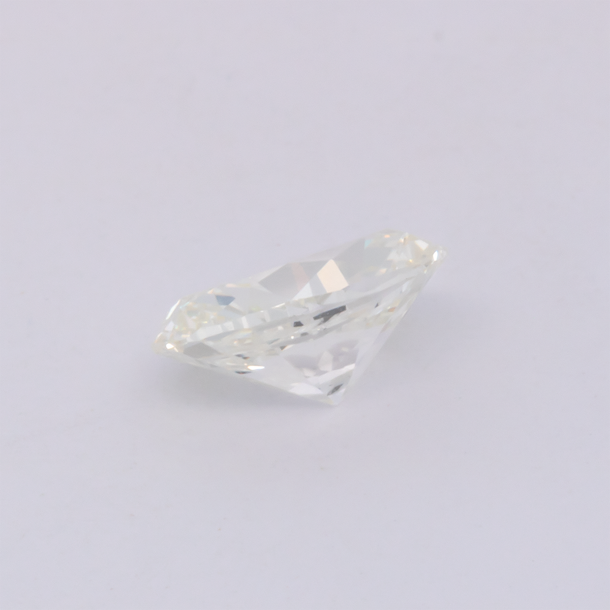 Diamond - tinted white, oval, 7.02x4.78 mm, 0.77 ct, No. DT1010