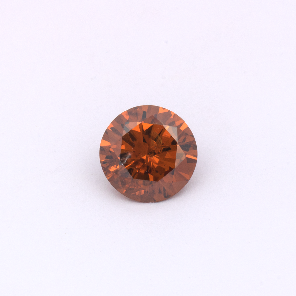 Diamond - brown & orange, round, 6.4x6.4 mm, 0.87 ct, No. DT1011