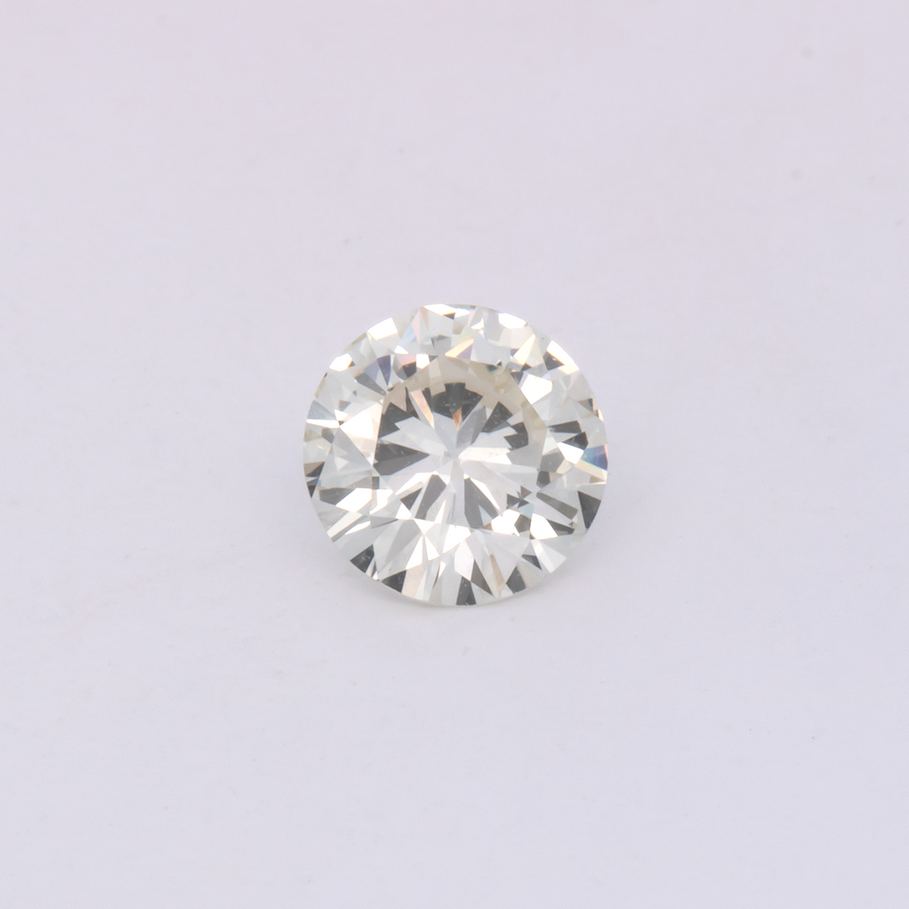 Diamond - slightly tinted yellow, round, 5.6x5.6 mm, 0.60 ct, No. DT1016