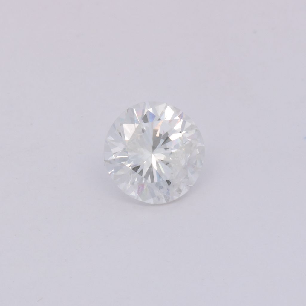 Diamond - slightly tinted yellow, round, 5.2x5.2 mm, 0.57 ct, No. DT1017