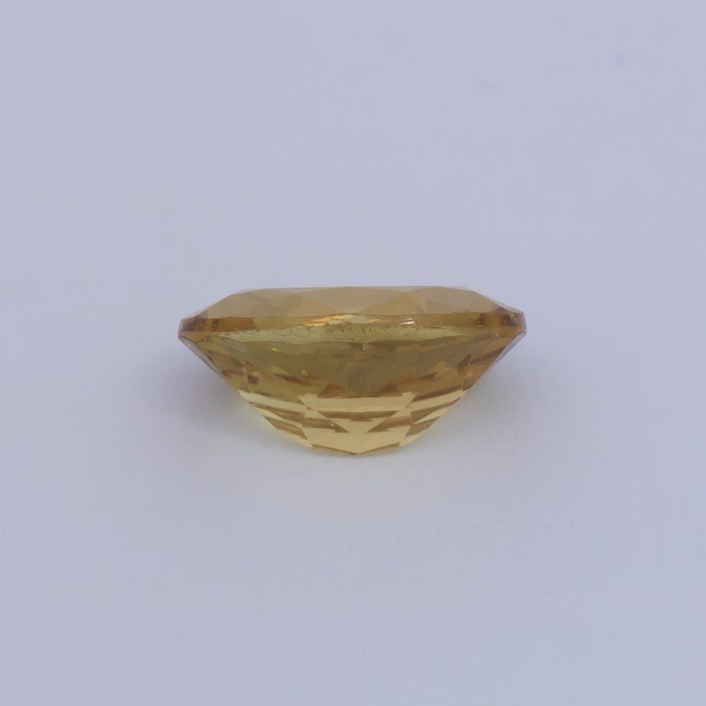Mali Granat - gelb, oval, 7x5.1 mm, 0.92 ct, Nr. MI10004