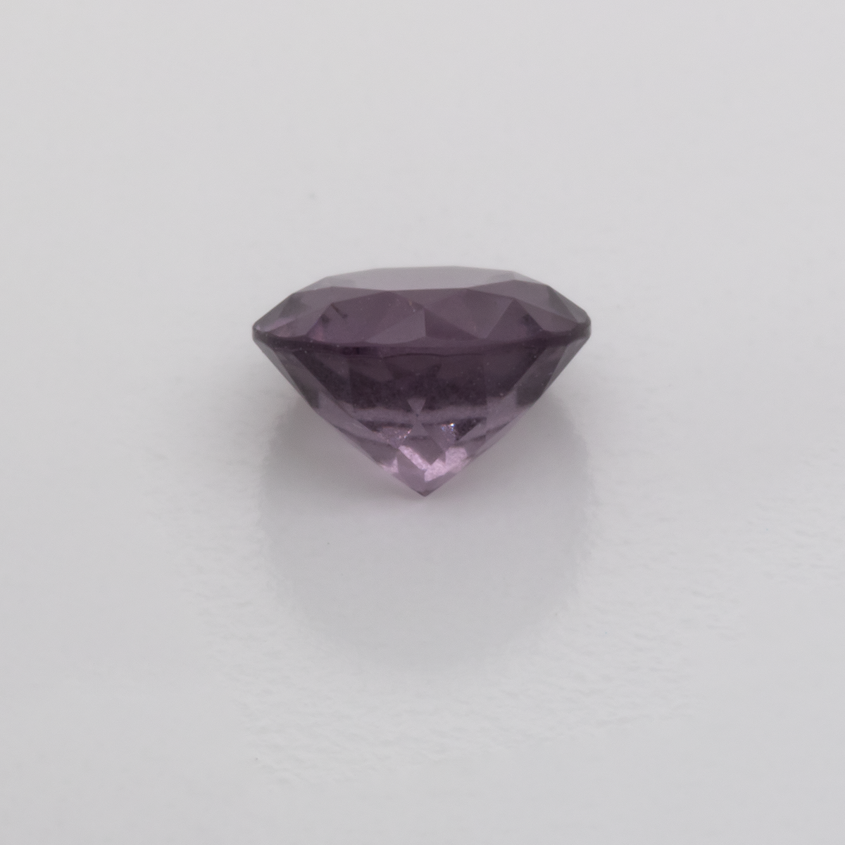 Spinell - lila, rund, 5.1x5.1 mm, 0.58 ct, Nr. SP90017