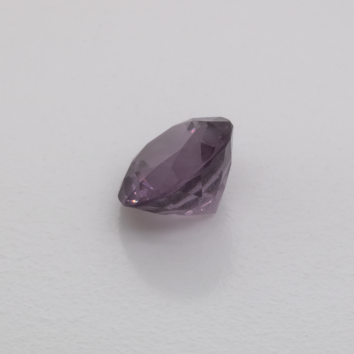 Spinell - lila, rund, 5.1x5.1 mm, 0.58 ct, Nr. SP90017