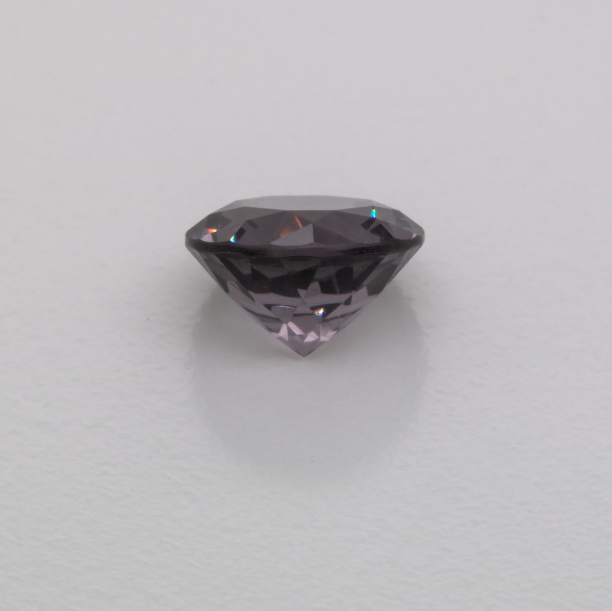 Spinell - lila/grau, rund, 5,1x5,1 mm, 0,55-0,59 ct, Nr. SP90018