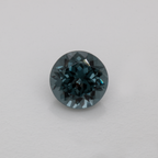 Spinell - grau, rund, 5.1x5.1 mm, 0.60 ct, Nr. SP90056