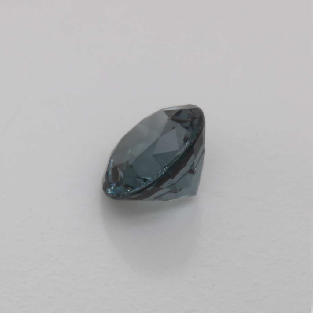 Spinell - grau, rund, 5.1x5.1 mm, 0.60 ct, Nr. SP90056