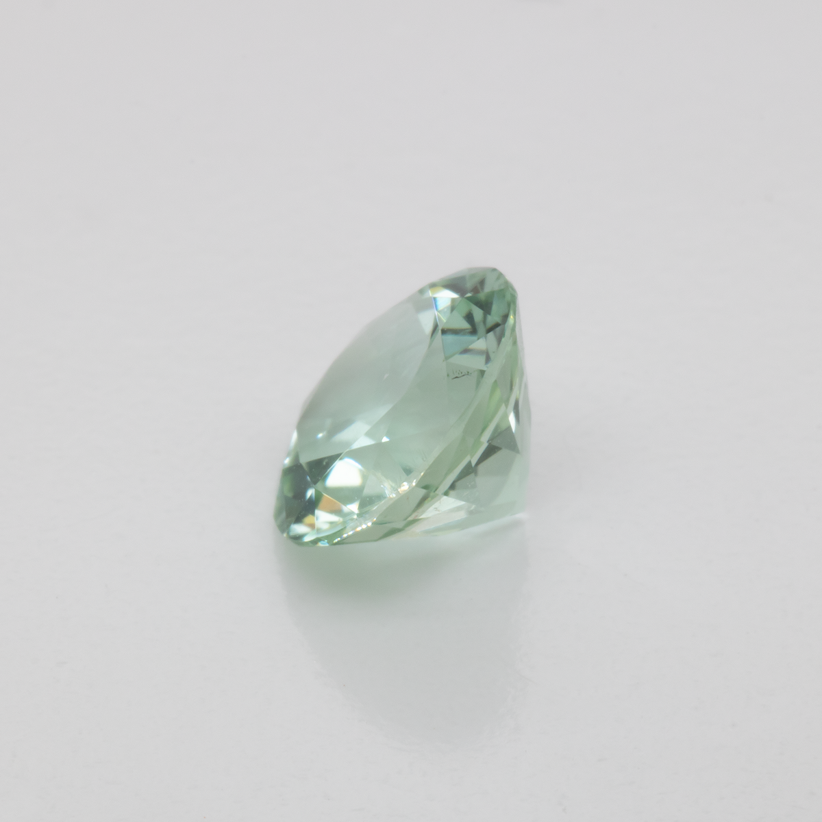 Turmalin - grün, rund, 6.5x6.5 mm, 0.97 ct, Nr. TR991055