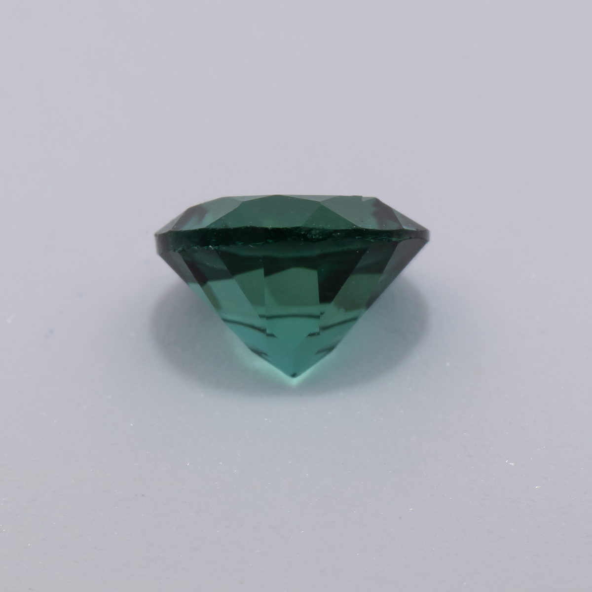 Turmalin - grün, rund, 5.5x5.5 mm, 0.52 - 0.64 ct, Nr. TR991063