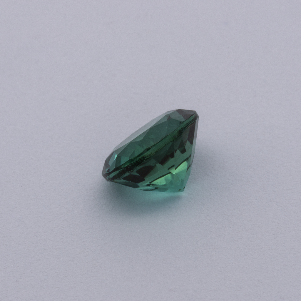 Turmalin - grün, rund, 5.1x5.1 mm, 0.51 ct, Nr. TR991073