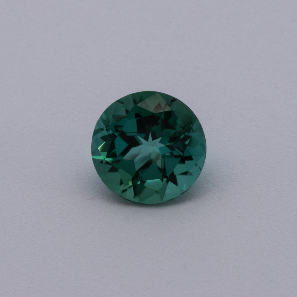 Turmalin - grün, rund, 5.1x5.1 mm, 0.51 ct, Nr. TR991073